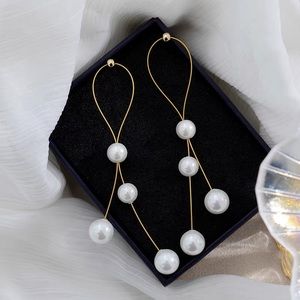 Long pearl tassel earrings